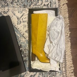 Never worn yellow and suede boots. Beautiful!